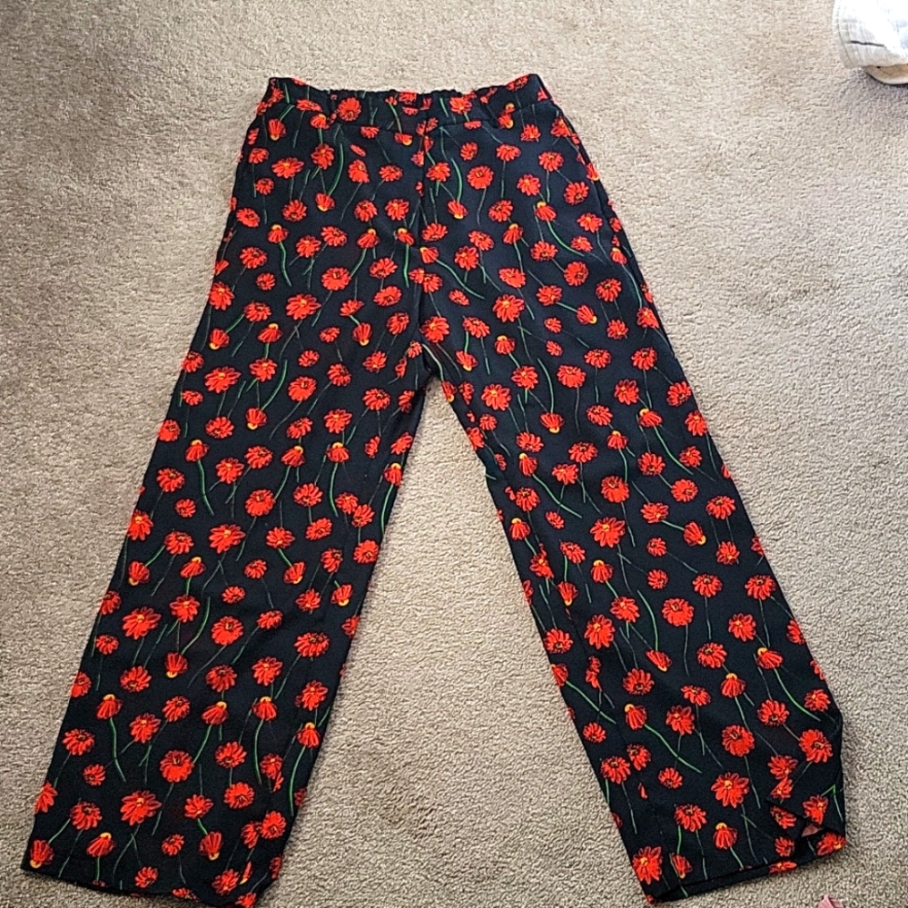 H & M bold red green and navy blue flower pants. Size 12.